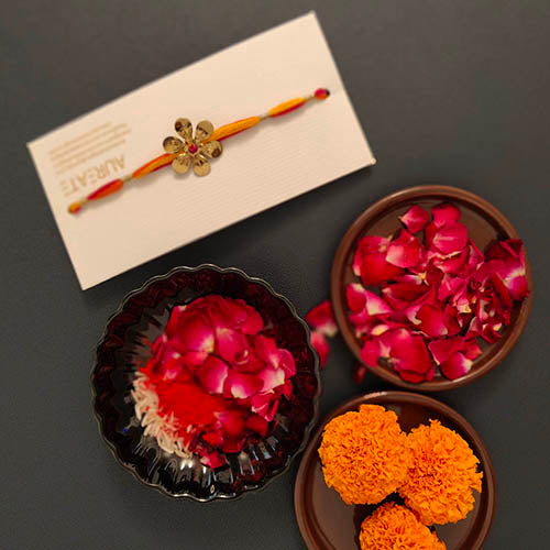 Orange / Crimson / Yellow Flower Gold Metal Pendant Rakhi
