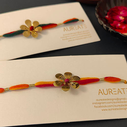 Orange / Crimson / Green Flower Gold Metal Pendant Rakhi