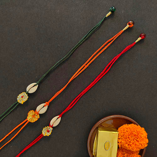 Cowrie Gota Green/Red/Orange Cotton Dori Set of 3 Rakhi