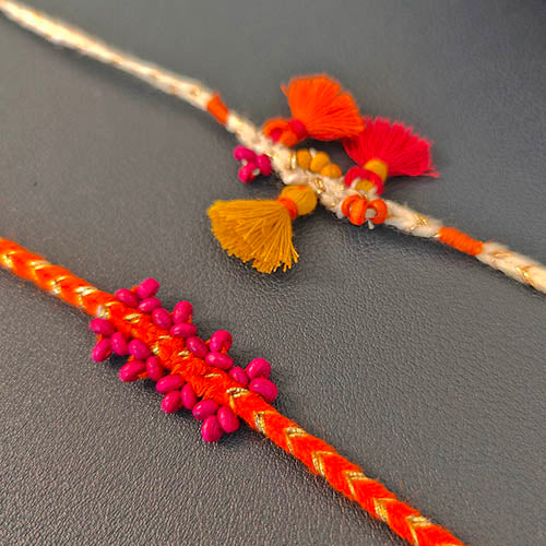 Tassel Pink / Orange Cotton Handmade Adult Rakhi (Set of 2)