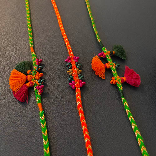 Tassel Orange Green Cotton Handmade Adult Rakhi (Set of 3)