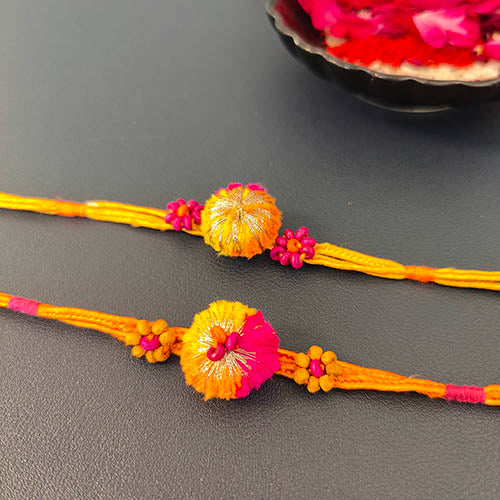 Pink/Orange Pom-pom Wooden Beads Rakhi (set of 2)