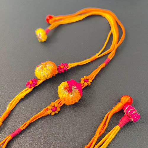 Pink/Orange Pom-pom Wooden Beads Rakhi (set of 2)