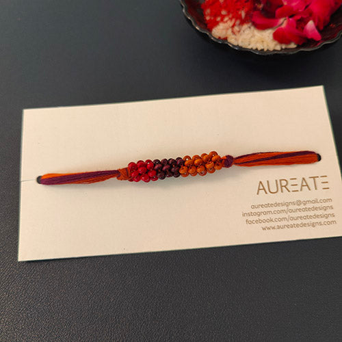 Rust/Orange Thread Wooden Beads Rakhi