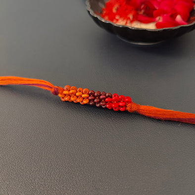 Rust/Orange Thread Wooden Beads Rakhi