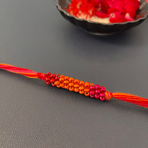 Pink/Coral Thread Wooden Beads Rakhi