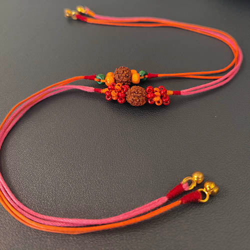 Rudraksha Wooden Beads Cotton Dori Rakhi ( set of 2 )